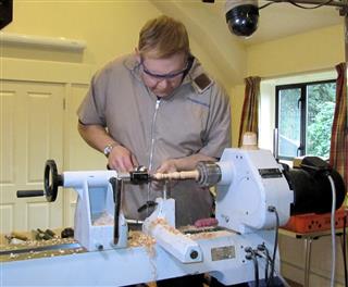 Simon Hope turning the spindle for his tape holder